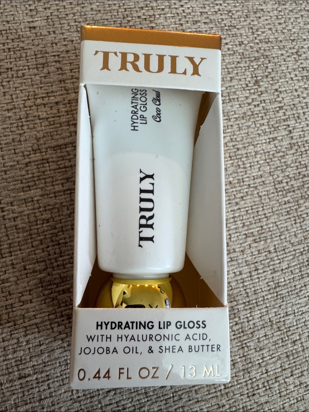 TRULY Hydrating Lip Gloss – White and Gold Tube.  Clear/ Coco Cloud